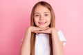 Photo of nice blond small girl hands face wear white t-shirt isolated on pink color background Royalty Free Stock Photo