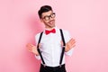 Photo of nice impressed brown hair guy look empty space wear spectacles white shirt isolated on pastel pink color Royalty Free Stock Photo