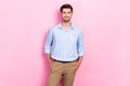 Photo of nice successful man director popular company stand dressed fashionable clothes isolated on pink color