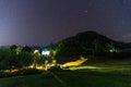 night landscape, Village under billions stars in himalayas Royalty Free Stock Photo