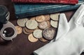 Photo of numismatist table with coins Royalty Free Stock Photo