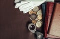 Photo of numismatist table with coins Royalty Free Stock Photo