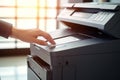 Photo of office& x27;s people using multifunction printer Royalty Free Stock Photo