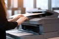 Photo of office& x27;s people using multifunction printer Royalty Free Stock Photo