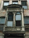 Old ruined terrace with two broken windows Royalty Free Stock Photo