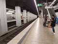 A photo of a old subway train arriving to a deserted  Main Trainstation station in Munich, Germany, in the time of the Corona Royalty Free Stock Photo
