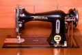 Photo of an old vintage hand sewing machine. Selective focus. Macro image.