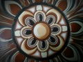 photo of one of the illustrations of ceramic flower models installed on the floor of a house just bought from a shop