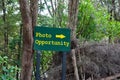 Photo opportunity sign in yellow text on green background