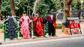Photo opportunity for tourists to dress in typical Seville Flamenco dresses, near Plaza Espana