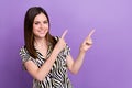 Photo of optimistic lady wear vintage zebra shirt pointing fingers empty space demonstrate new product isolated on Royalty Free Stock Photo