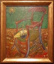 Photo of the original painting: `Gauguin`s Chair` by Vincent Van Gogh.