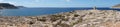 Photo panorama. Cape in the Mediterranean Sea near the Cumnija Sewage Treatment Plant. Mellieha, Malta