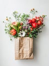 Photo of a paper bag filled with fresh vegetables and flowers on a white background, in the aest