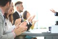 Photo of partners clapping hands after business seminar. Professional education, work meeting, presentation or coaching Royalty Free Stock Photo