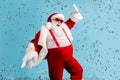 Photo of pensioner old man grey beard careless north pole closed party dance having fun colorful confetti wear santa x Royalty Free Stock Photo