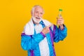 Photo of pensioner wear retro costume indicate finger aqua promo recommend isolated over yellow color background Royalty Free Stock Photo