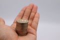 A person holding a 500 yen coin Royalty Free Stock Photo