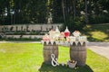 Photo with picnic decoration for a holiday with large bottles of lemonade and cocktails organized on two large wooden barrels, a