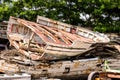 Old and broken wooden boat stranded