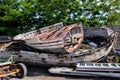 Old and broken wooden boat stranded