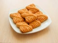 The photo of a pile of cookies or shortcake biscuits on the plate