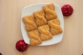 The photo of a pile of cookies or shortcake biscuits on the plate