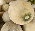 Photo of a pile of large, fresh melons that are ripe, the inside is fresh, green and yellow. Royalty Free Stock Photo