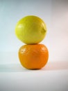 Photo of a pile of lemons and oranges with detail on the lemon tip