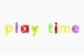 Play time` spelled with alphabet magnets over white background Royalty Free Stock Photo