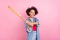 Photo of playful crazy hipster lady hold baseball bat hit air wear denim jacket isolated pink color background