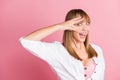 Photo of playful crazy young lady fingers cover eye excited peeking wear white blouse isolated pink color background