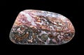 Photo of a Polished, Natural Stone Jasper in A Colorful Red-Brown Hue. Isolated On Black Background Royalty Free Stock Photo