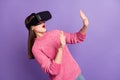 Photo portrait of amazed shocked girl three-dimensional glasses playing 3d game virtual reality isolated on bright