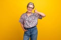 Photo portrait of attractive pensioner woman thumb up good quality wear trendy leopard print clothes isolated on yellow Royalty Free Stock Photo