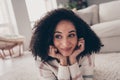 Photo portrait of attractive young woman lying floor look empty space dressed casual clothes cozy day light home Royalty Free Stock Photo