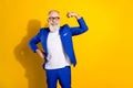 Photo portrait of businessman wearing blue suit glasses showing strong muscles personal branding isolated on vivid Royalty Free Stock Photo