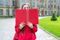 Photo portrait of charming beautiful cheerful excited teen hipster millennial closing covering her face and smile with big open Royalty Free Stock Photo