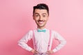 Photo portrait of cheerful caricatured guy with hands on waist isolated on pink colored background