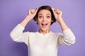 Photo portrait of clever female student taking off spectacles opened mouth isolated on bright purple color background