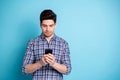 Photo portrait of confident handsome clever intelligent it specialst developing new game playing testing notification on Royalty Free Stock Photo