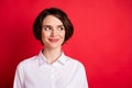 Photo portrait of curious business woman wearing white shirt looking empty space isolated on bright red color background