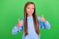Photo portrait of cute little girl show double thumb up positive feedback dressed trendy blue sportswear  on Royalty Free Stock Photo