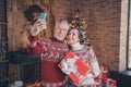 Photo portrait elder couple taking selfie together with new year presents in decorated apartments