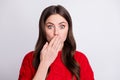 Photo portrait of female student closed mouth with hands keeping secret speechless isolated on pastel grey color