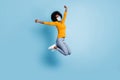 Photo portrait full body of excited girl celebrating jumping up wear facial mask isolated on pastel blue colored Royalty Free Stock Photo