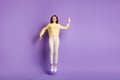 Photo portrait full body view of woman jumping up making robot moves isolated on vivid violet colored background