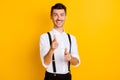Photo portrait of funky happy gentleman pointing fingers choosing selecting you smiling isolated on vivid yellow color