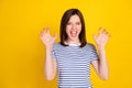 Photo portrait of funky young lady fooling show fingers claws growl tiger wear stylish striped garment isolated on Royalty Free Stock Photo