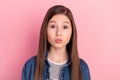 Photo portrait of girl in jeans jacket pouted lips sending air kiss cute sweet on pastel pink color background